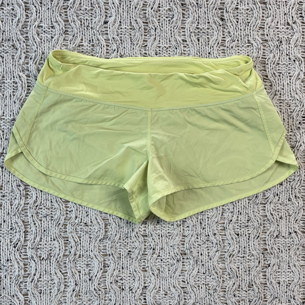 Lululemon Running Shorts Womens 8 Limelight Body Curved Flippy Hem Bottoms